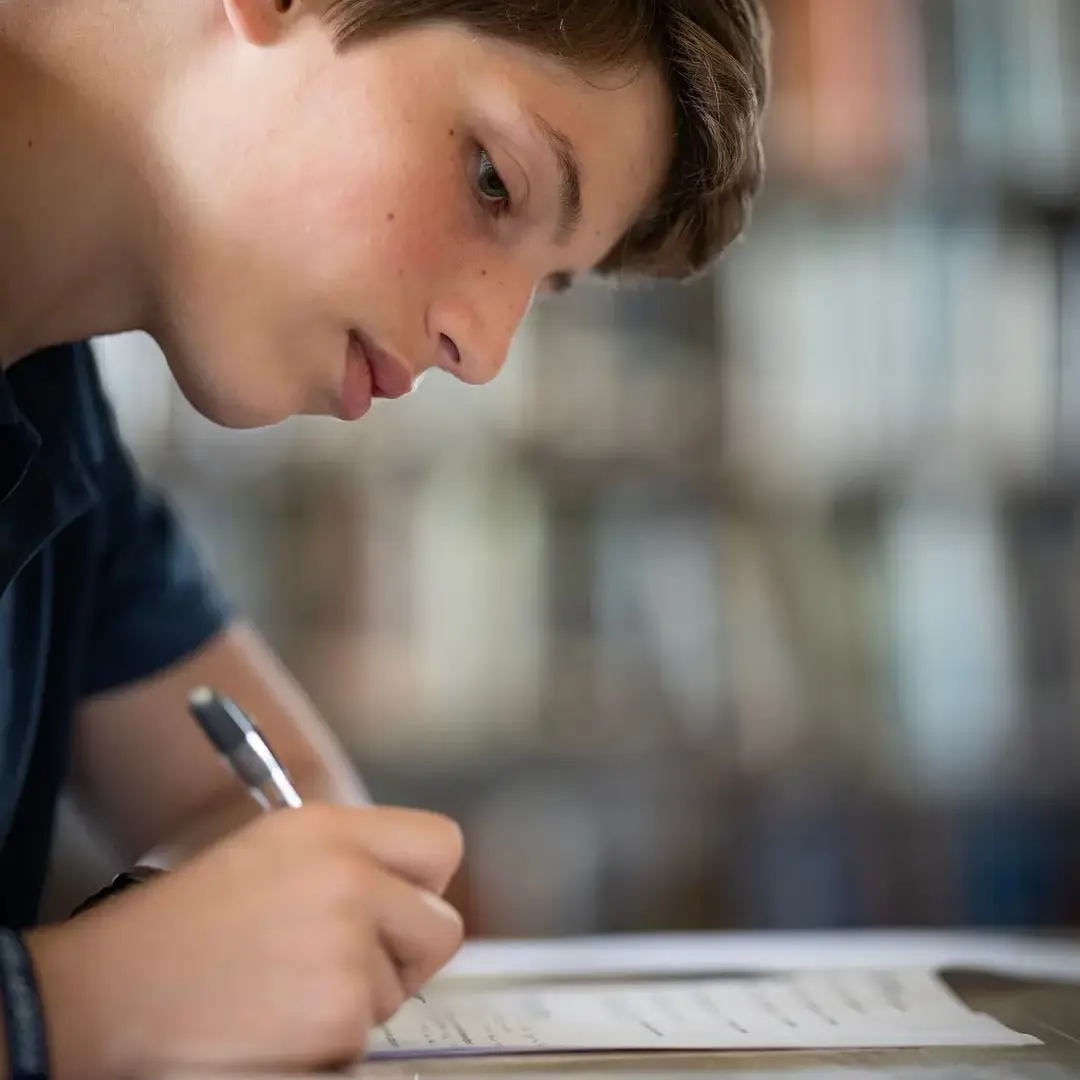 Student writing essay