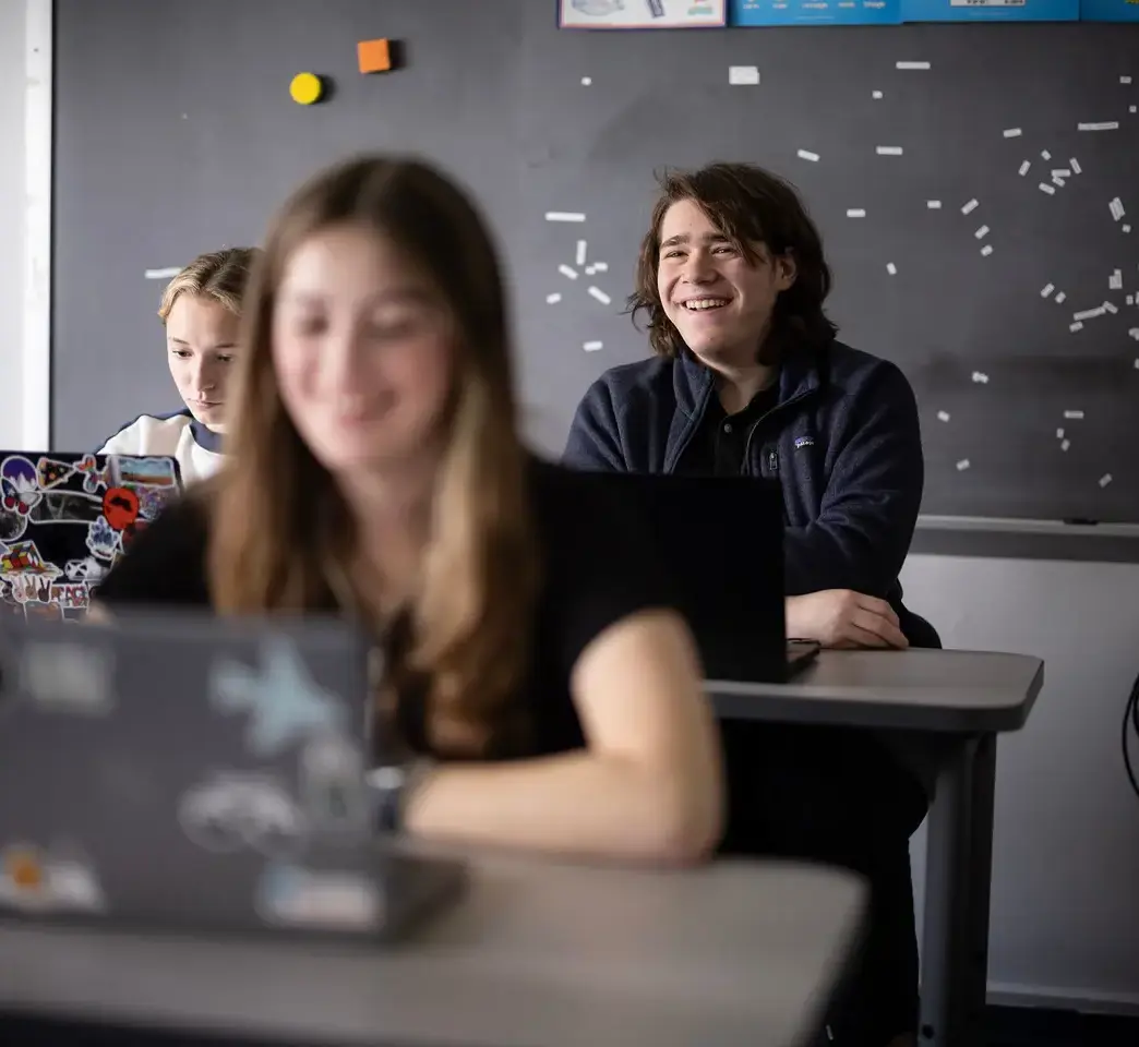 Students smiling in class