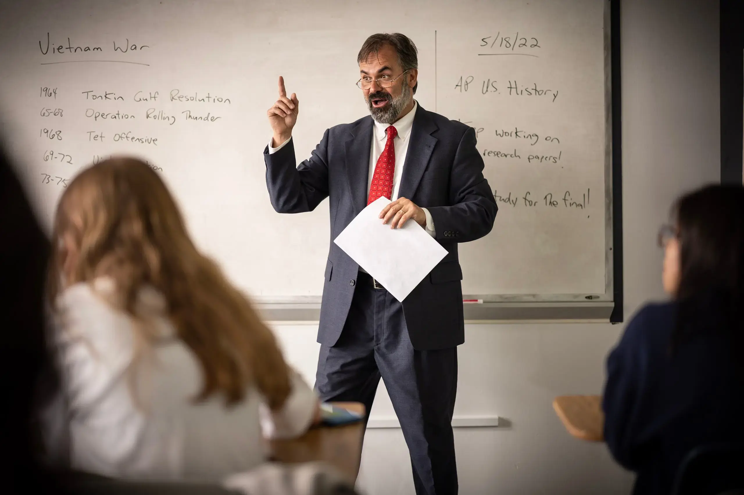 Teacher conducting history class