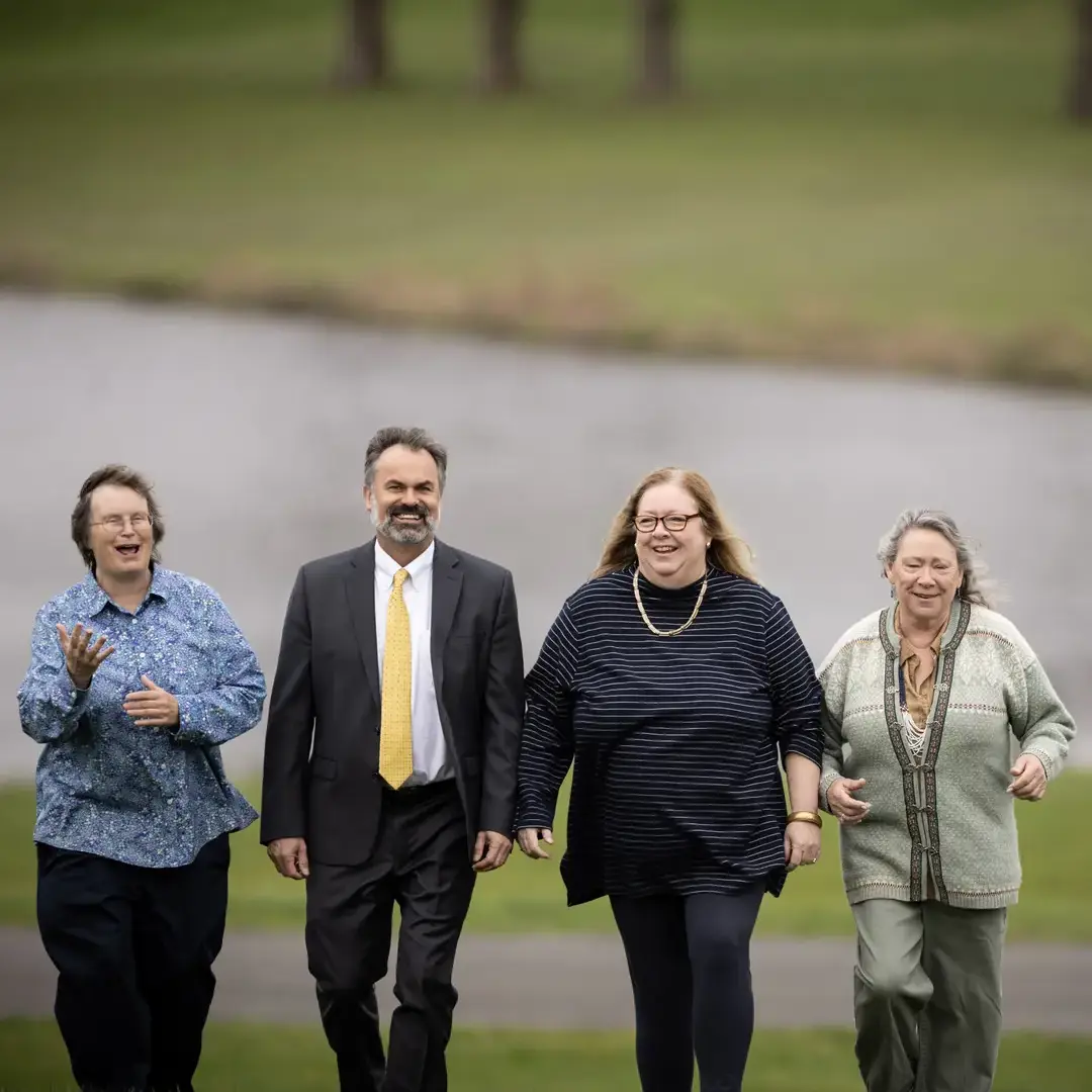 Teachers walking by lake