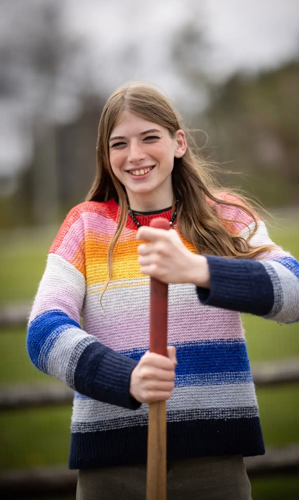 Student doing after school gardening activities