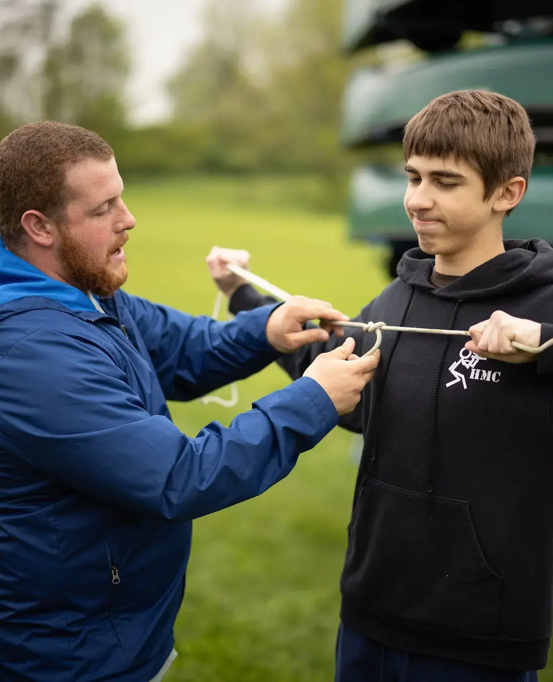 Student learning how to tie rope knots