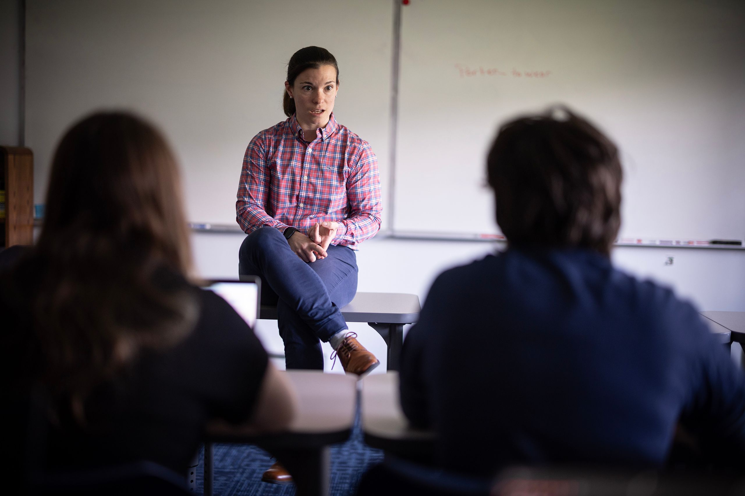 Teacher conducting class