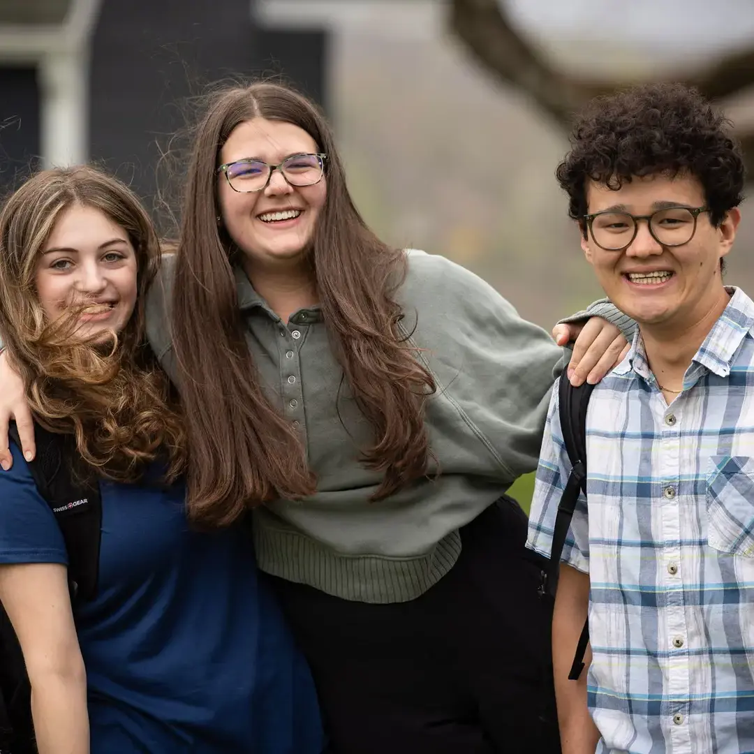Students smiling and posing for photo